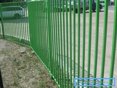 In the photo - the fence of the profile pipe In the photo - the fence of the profile pipe