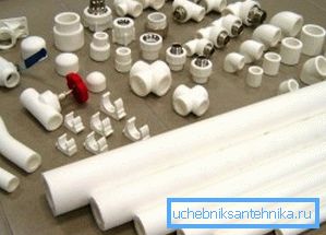 In the photo - plastic pipes and fittings