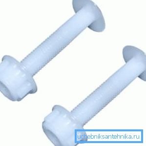 In the photo - plastic screws and a nut to attach the toilet seat to the toilet. In the photo - plastic screws and a nut to attach the toilet seat to the toilet.