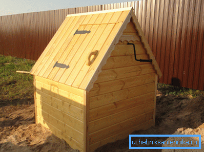 In the photo: the full lining of the well really makes the construction look like a house In the photo: the full lining of the well really makes the construction look like a house