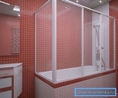 The photo shows a bathroom with a perimeter shower screen. The photo shows a bathroom with a perimeter shower screen.