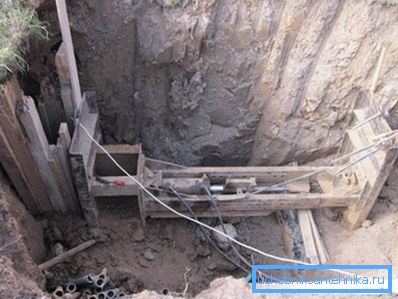 In the photo a puncture of the soil under the road surface In the photo a puncture of the soil under the road surface