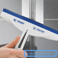 In the photo, a rubber scraper is the safest tool. In the photo, a rubber scraper is the safest tool.