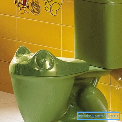 In the photo - a sanitary device in the form of a frog In the photo - a sanitary device in the form of a frog