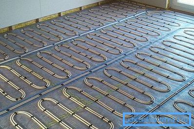 On a photo - the system a heat-insulated floor works at low temperatures of the heat carrier On a photo - the system a heat-insulated floor works at low temperatures of the heat carrier