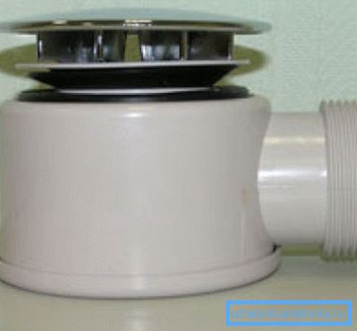 In the photo: the drain unit is a special design with a grate to protect against debris. In the photo: the drain unit is a special design with a grate to protect against debris.