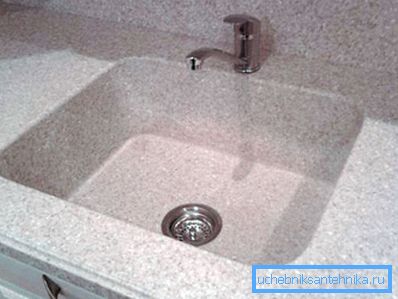 In the photo: a tabletop with a sink made of artificial stone is a universal solution that allows solving several issues in one fell swoop.