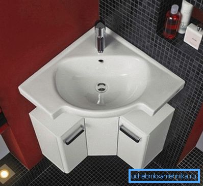 In the photo - the corner type sink for the bathroom In the photo - the corner type sink for the bathroom