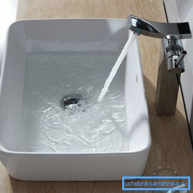 In the photo - mounted on the countertop faucet In the photo - mounted on the countertop faucet