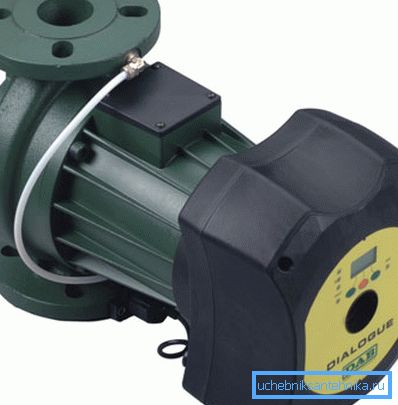 The photo shows a device with a flange connection for large diameters.