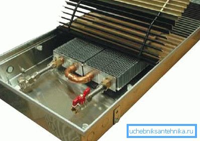 In the photo - a water convector in the case In the photo - a water convector in the case
