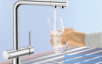 The illustration shows a kitchen faucet with a drinking tap with two holes. The illustration shows a kitchen faucet with a drinking tap with two holes.