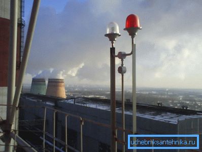 The figure shows the light fence of chimneys of an industrial enterprise. The figure shows the light fence of chimneys of an industrial enterprise.