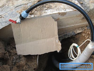 Heating cable in the pipe outlet in the heater with heating.