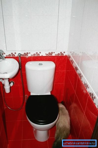 Floor toilet and sink in the toilet with hygienic shower Floor toilet and sink in the toilet with hygienic shower