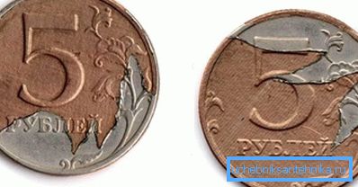 Broken cladding layer on a 5-ruble coin. Broken cladding layer on a 5-ruble coin.