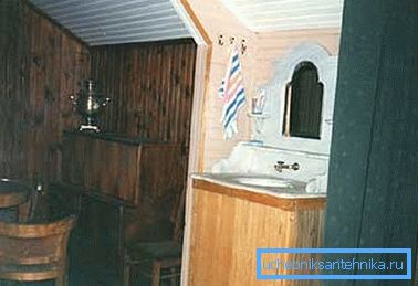 Some craftsmen use for this purpose a regular cabinet with a sink, over which they simply install a tank with water. Some craftsmen use for this purpose a regular cabinet with a sink, over which they simply install a tank with water.