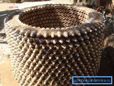 Unusual well from plastic bottles with an insert inside. Unusual well from plastic bottles with an insert inside.