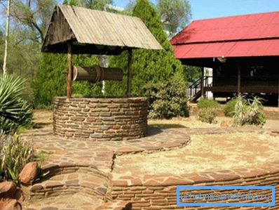 Facing the well and the surrounding area with natural stone Facing the well and the surrounding area with natural stone