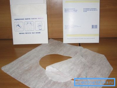 Disposable paper pads on the toilet Disposable paper pads on the toilet