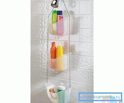 Organizer suspended directly behind the divider
