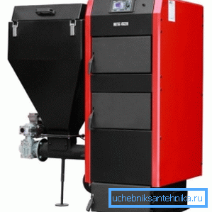 Pellet boiler with automatic fuel supply system.
