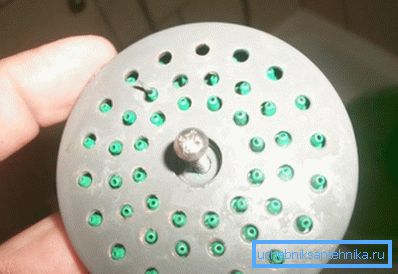 Under the plug hides the mounting screw. Under the plug hides the mounting screw.