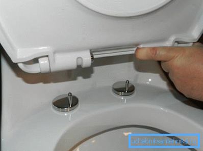 Properly mounted fixtures will securely fasten the lid on the toilet Properly mounted fixtures will securely fasten the lid on the toilet