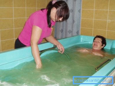 Reception of water procedures with underwater massage shower Reception of water procedures with underwater massage shower
