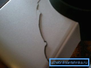 An example of the formation of cracks on the body of a plastic washbasin An example of the formation of cracks on the body of a plastic washbasin
