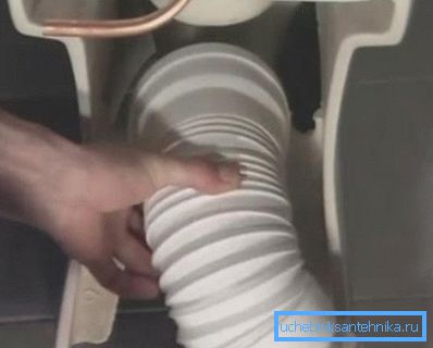 Attaching the toilet to the second end of the corrugated cuff Attaching the toilet to the second end of the corrugated cuff