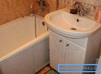 Sink for a toilet with a curbstone under household accessories Sink for a toilet with a curbstone under household accessories