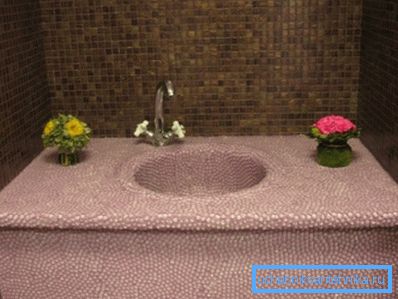 The mosaic sink looks quite original The mosaic sink looks quite original