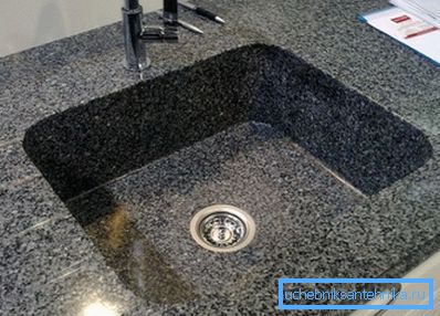 The sink is one piece with the table top. The sink is one piece with the table top.