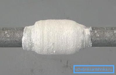 Repair using a bandage dipped in cement mortar Repair using a bandage dipped in cement mortar