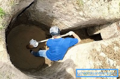 Digging a pit for installing a caisson Digging a pit for installing a caisson
