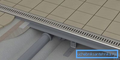 Slit shower drain is built into the slit floor Slit shower drain is built into the slit floor