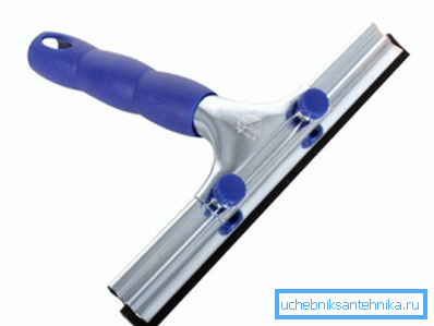 Scraper for cleaning glass surfaces Scraper for cleaning glass surfaces