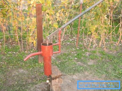 Well with a hand pump at the dacha Well with a hand pump at the dacha