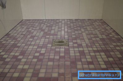 Drain in the shower without a tray is located in the floor screed. Drain in the shower without a tray is located in the floor screed.