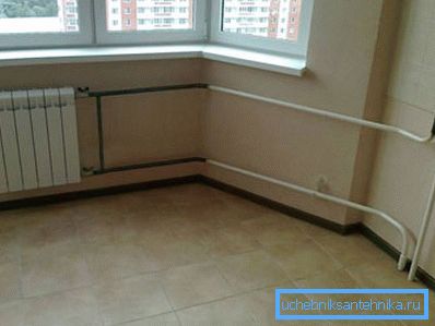 Modern heating radiator in the interior of a residential apartment. Modern heating radiator in the interior of a residential apartment.