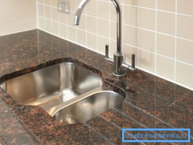 Steel bowl under the stone countertop. Steel bowl under the stone countertop.