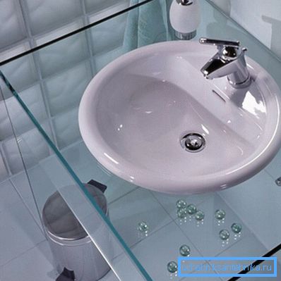 Glass will give the bathroom airiness.