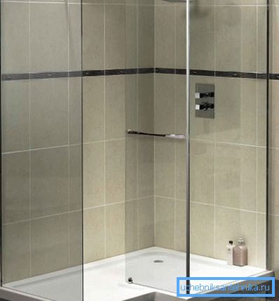 Glass shower enclosure fits perfectly into any interior.