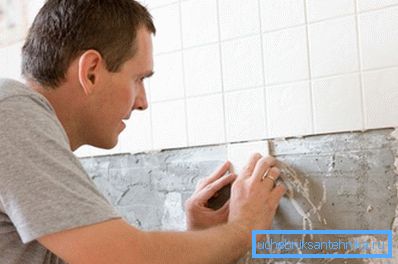Walls are tiled with minimal gaps.