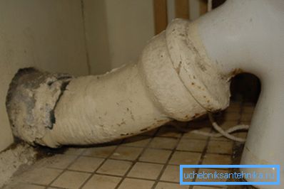 Cast iron pipe and toilet seat