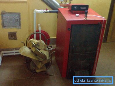 Solid fuel boiler in a specially equipped boiler room Solid fuel boiler in a specially equipped boiler room