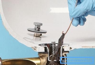 Hair removal from the shower cabin drain Hair removal from the shower cabin drain