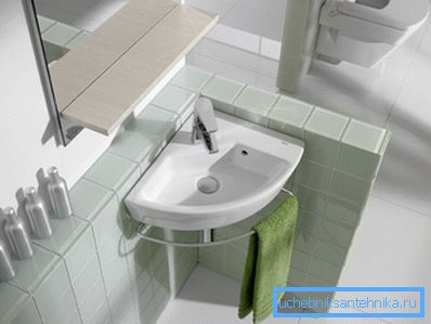 Corner mini sink in the bathroom Corner mini sink in the bathroom