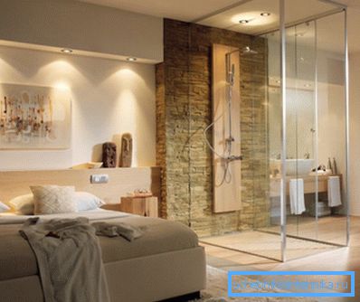 Corners make the shower compartment an organic part of the interior in a studio apartment Corners make the shower compartment an organic part of the interior in a studio apartment